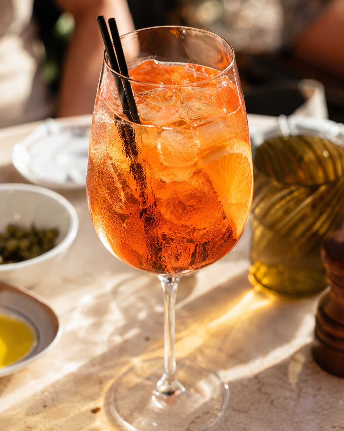 The signature spritz, condensation and colour.